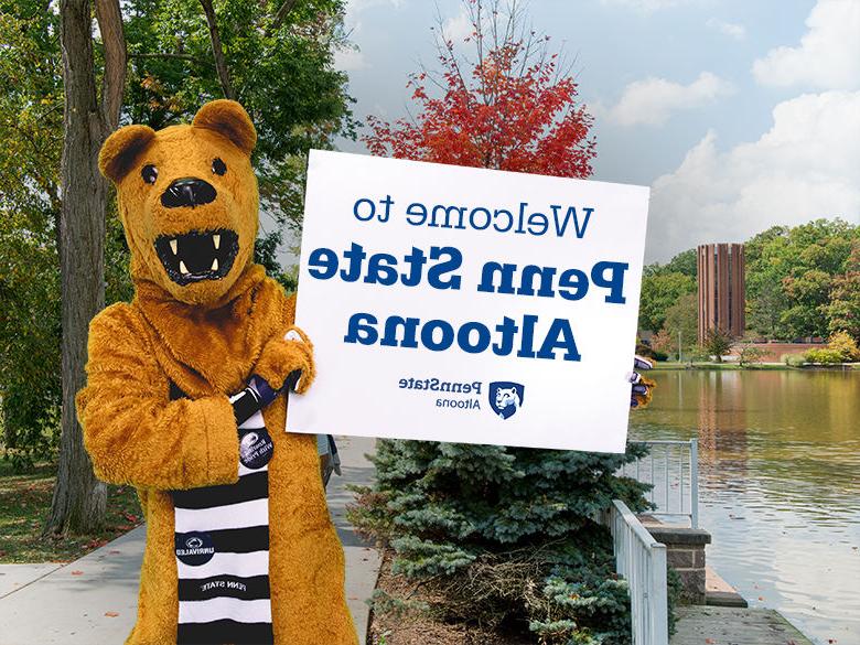 The Nittany Lion mascot holding up a sign reading Welcome to <a href='http://dwi5mh.4dian8.com'>十大网投平台信誉排行榜</a>阿尔图纳分校
